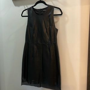 Black faux leather dress.